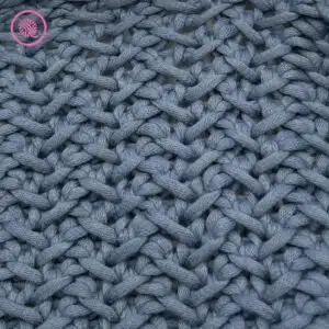 Vertical herringbone stitch pattern close up